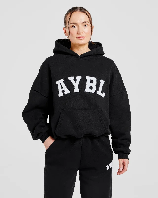 Varsity Oversized Hoodie - Schwarz Hoodie with Metallic Shiny Futuristic